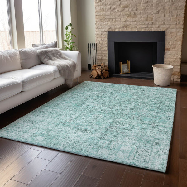 HomeRoots 9' X 12' Teal and Ivory Floral Area Rug - Durable, Washable, UV-Protected for High-Traffic Spaces 651219