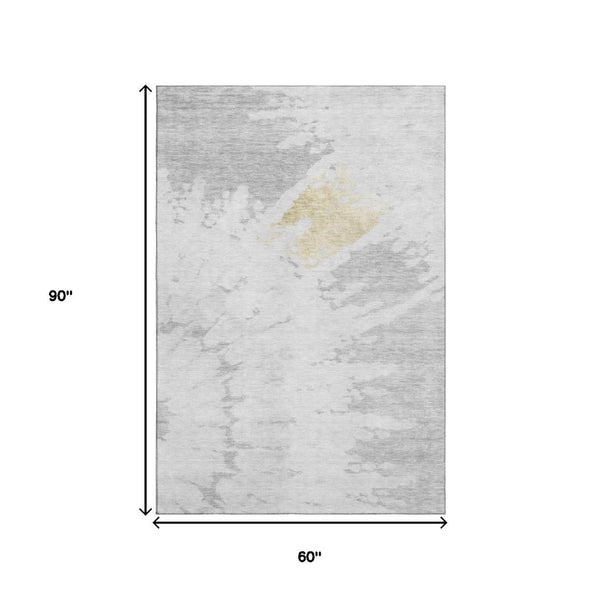 HomeRoots 5' X 8' Elegant Silver Gold Ivory Abstract Area Rug - Washable, UV Protected, Stain Resistant Design 651306