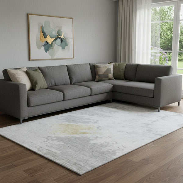 HomeRoots 9' X 12' Modern Abstract Washable Area Rug in Silver, Gold & Ivory – Stain Resistant with UV Protection 651309