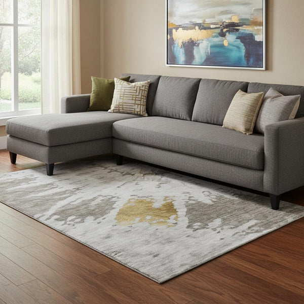 HomeRoots 10' X 14' Taupe Gold & Ivory Abstract Area Rug - Stylish, Washable, UV-Protected for Busy Spaces! 651316