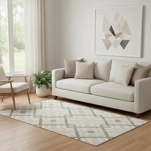HomeRoots 5' X 8' Washable Beige & Ivory Geometric Area Rug with UV Protection for Modern Living Spaces 651366