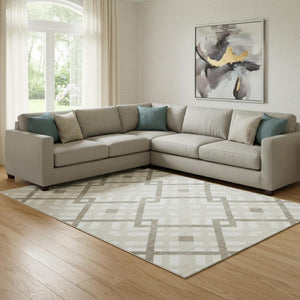 HomeRoots 9' X 12' Beige and Ivory Geometric Area Rug - Washable, UV Protected, Stain Resistant for High-Traffic Spaces 651369