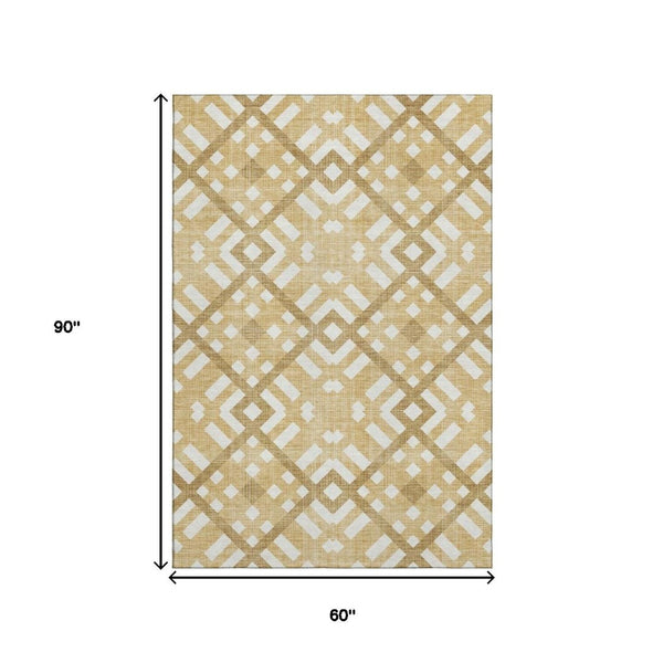 HomeRoots 5' X 8' Gold and Ivory Geometric Area Rug - Washable, UV Protected, Durable, and Stylish Design! 651378