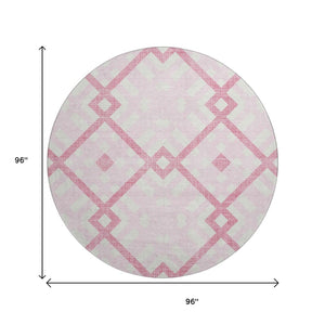HomeRoots 8' Pink And Ivory Geometric Round Rug - Stylish, Washable, UV Protected, and Perfect for Families 651409