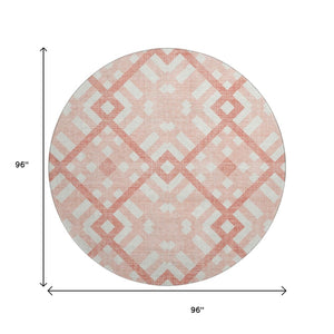HomeRoots 8' Salmon and Ivory Geometric Round Rug - Washable, UV Protected, Non-Slip for High-Traffic Areas 651433