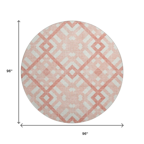 HomeRoots 8' Salmon and Ivory Geometric Round Rug - Washable, UV Protected, Non-Slip for High-Traffic Areas 651433