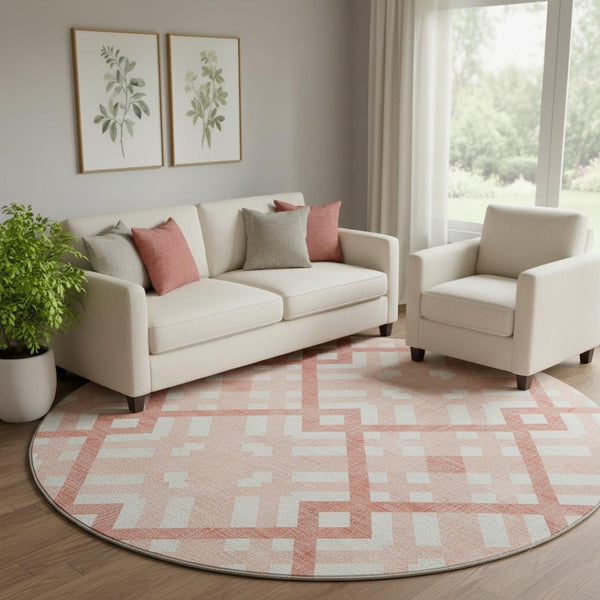 HomeRoots 8' Salmon and Ivory Geometric Round Rug - Washable, UV Protected, Non-Slip for High-Traffic Areas 651433