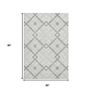 HomeRoots 5' X 8' Modern Silver & Ivory Geometric Area Rug - Washable, UV-Resistant, Perfect for Any Space! 651438