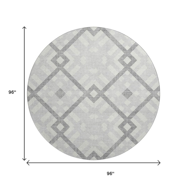 HomeRoots 8' Silver and Ivory Geometric Round Rug - Washable, UV Protected, Stylish for Living Spaces & Patios 651439