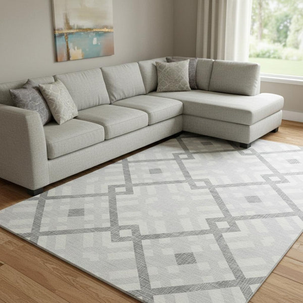 HomeRoots 8' X 10' Silver and Ivory Geometric Area Rug - Washable, UV-Protected, Stylish for High-Traffic Homes 651440