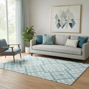 HomeRoots 5' X 8' Modern Teal and Ivory Geometric Area Rug - Washable, UV Protected, Stain-Resistant Beauty 651444