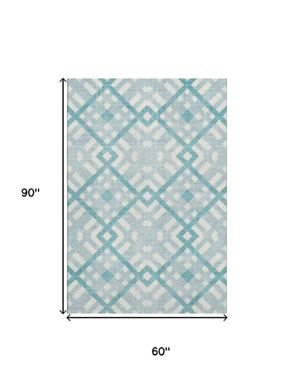 HomeRoots 5' X 8' Modern Teal and Ivory Geometric Area Rug - Washable, UV Protected, Stain-Resistant Beauty 651444