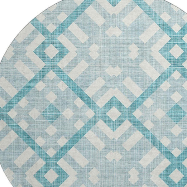 HomeRoots 8' Teal and Ivory Geometric Round Rug - Washable, UV-Protected, Durable, Perfect for Homes with Kids! 651445
