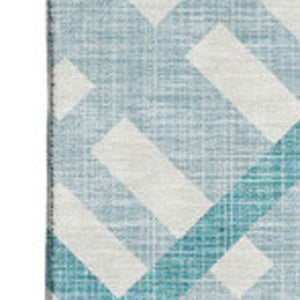 HomeRoots 9' X 12' Teal and Ivory Geometric Area Rug - Washable, UV Protected, Perfect for High-Traffic Spaces! 651447