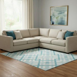 HomeRoots 9' X 12' Teal and Ivory Geometric Area Rug - Washable, UV Protected, Perfect for High-Traffic Spaces! 651447