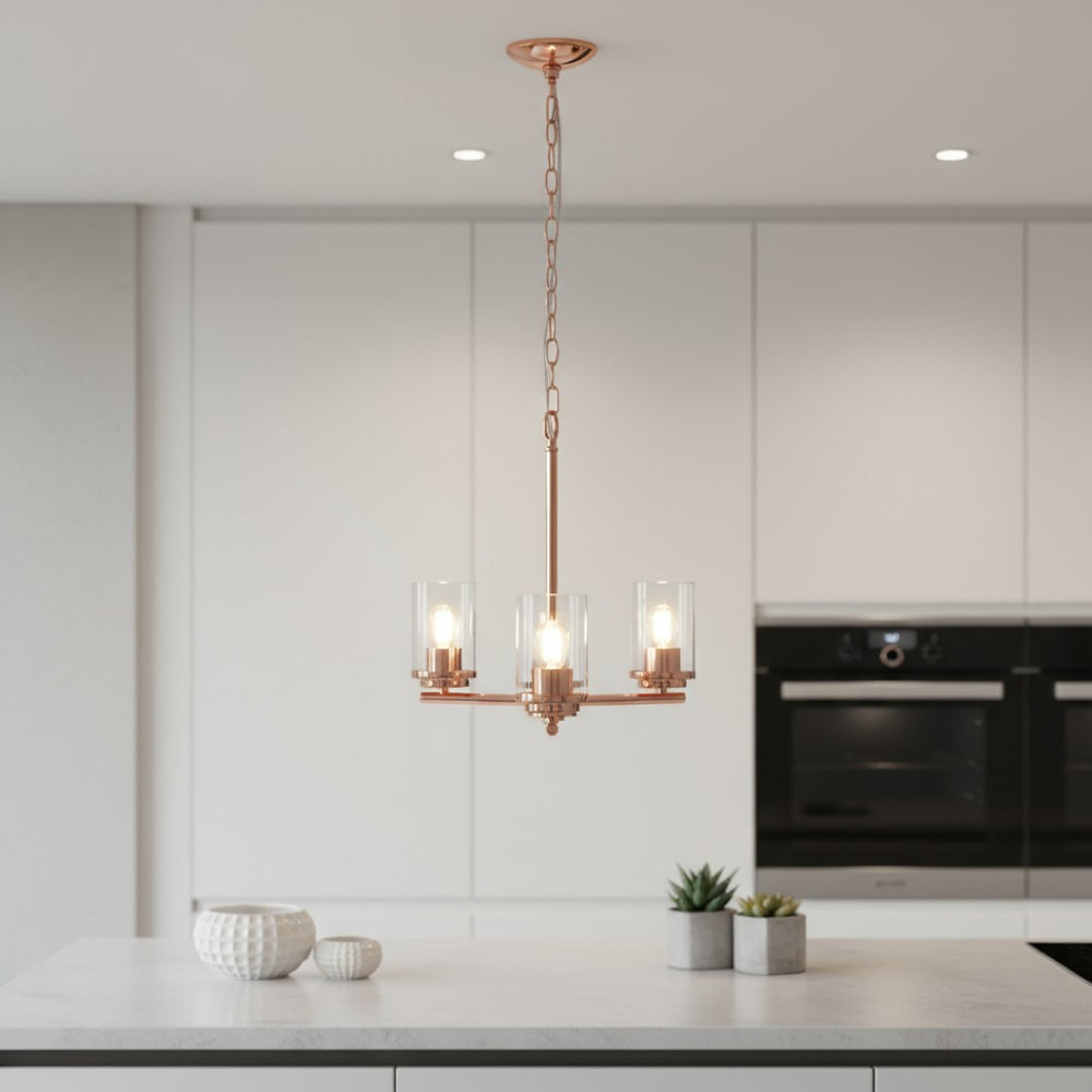 HomeRoots Rose Gold Three-Light Chandelier with Clear Shades – Elegant Iron Ceiling Fixture for Any Space 651651