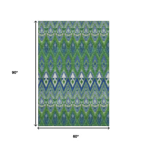 HomeRoots 5' Southwestern Washable Area Rug in Green, Blue & Ivory – UV Protected, Durable & Stylish Design! 651901