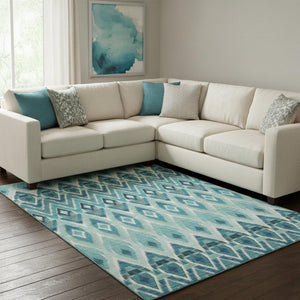 HomeRoots 9' X 12' Southwestern Washable Area Rug in Teal, White & Gray - UV Protected, Durable, Stylish Design 651922
