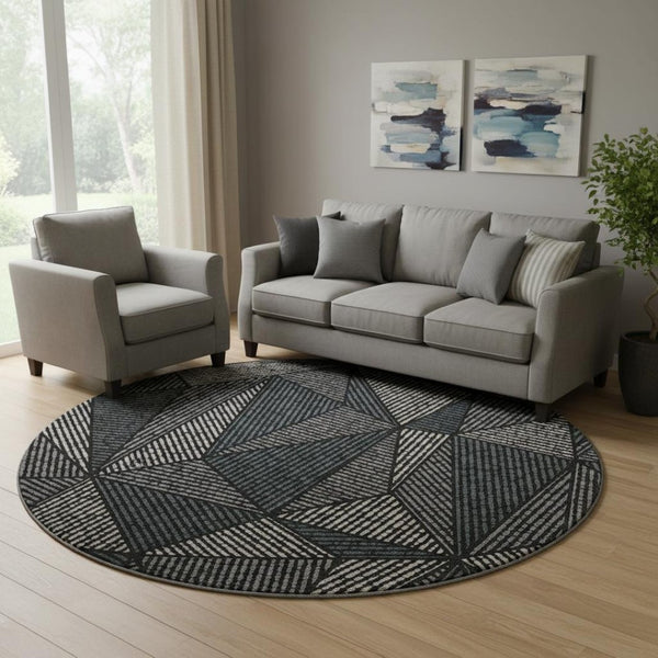 HomeRoots 8' Stylish Black and Ivory Geometric Washable Round Rug with UV Protection for Easy Care Living Spaces 651932