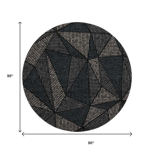 HomeRoots 8' Stylish Black and Ivory Geometric Washable Round Rug with UV Protection for Easy Care Living Spaces 651932