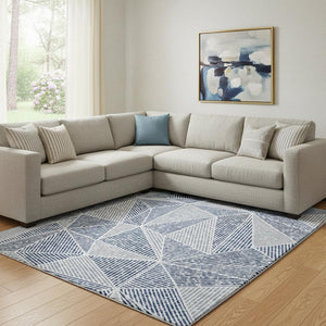 HomeRoots 8' X 10' Navy Blue Geometric Area Rug - Washable, UV Protected, Stain Resistant for Modern Spaces 651969