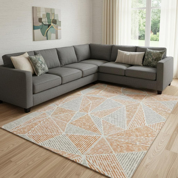 HomeRoots 10' X 14' Orange & Gray Geometric Area Rug - Washable, UV-Protected, Durable for Active Homes! 651977