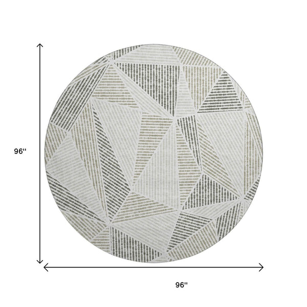 HomeRoots 8' Taupe and Silver Geometric Round Rug - Washable, UV-Protected, Modern Design for Any Space 651992