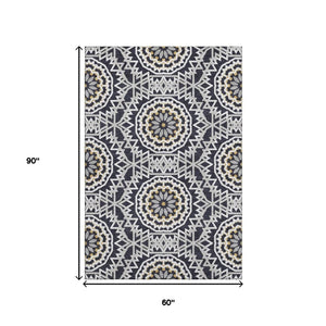 HomeRoots 5' X 8' Washable Black Ivory & Gold Geometric Area Rug with UV Protection for Modern Spaces 652193