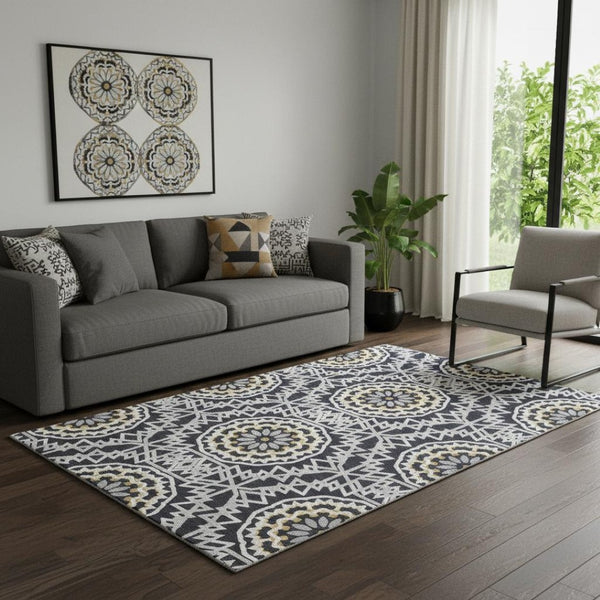 HomeRoots 5' X 8' Washable Black Ivory & Gold Geometric Area Rug with UV Protection for Modern Spaces 652193