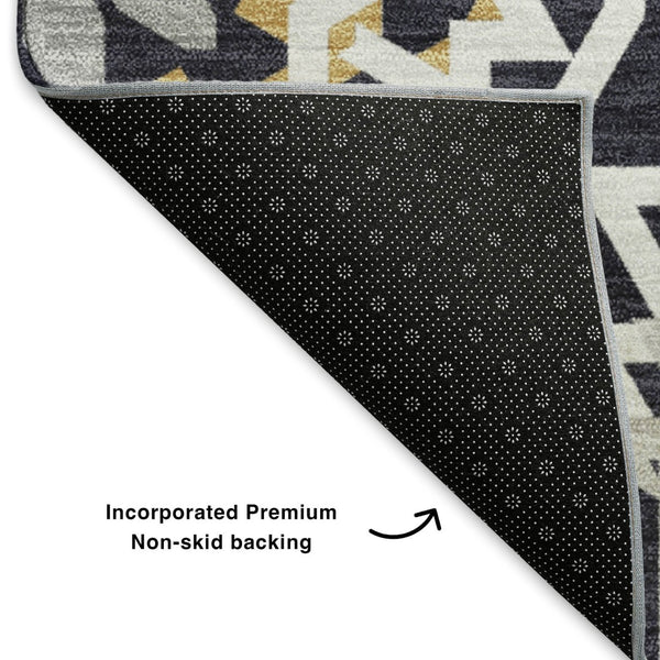 HomeRoots 9' X 12' Geometric Washable Area Rug in Black, Ivory & Gold - UV Protected for High-Traffic Spaces 652196