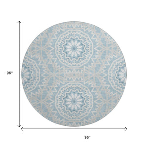 HomeRoots 8' Denim Blue Round Rug with Ivory Geometric Design - Washable, UV Resistant & Stain-Proof Style 652218
