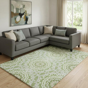 HomeRoots 10' Green and Ivory Geometric Area Rug - Washable, UV-Protected, Stylish for High-Traffic Spaces 652227