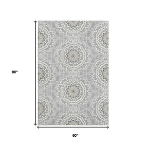 HomeRoots 5' Gray and Ivory Geometric Area Rug - Washable, UV Protected, Stain Resistant for High-Traffic Areas 652235