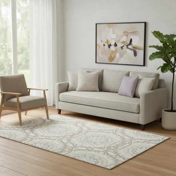 HomeRoots 5' X 8' Ivory and Gray Geometric Area Rug - Washable, Stain Resistant, UV Protected for Modern Spaces 652241