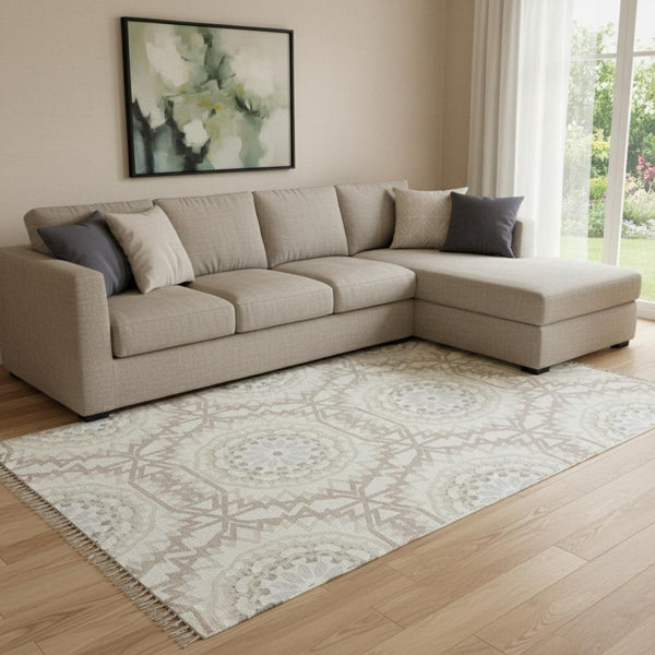 HomeRoots 8' X 10' Ivory and Gray Geometric Washable Area Rug with UV Protection for Modern Living Spaces 652243
