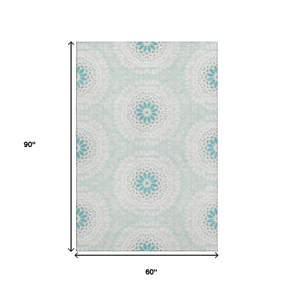 HomeRoots 5' X 8' Teal and Ivory Geometric Area Rug with UV Protection, Stain Resistant for Modern Homes 652295