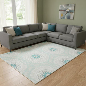HomeRoots 10' X 14' Teal And Ivory Geometric Area Rug - Washable, UV-Protected, Durable for Busy Homes 652299