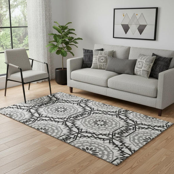 HomeRoots 5' X 8' Stylish Black and White Geometric Area Rug - Washable, UV Protected, Easy Care for Homes 652307