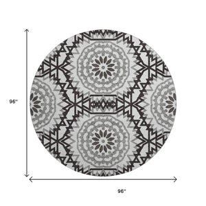HomeRoots 8' Modern Geometric Washable Round Rug - Stylish Black & White with UV Protection for Any Space 652308