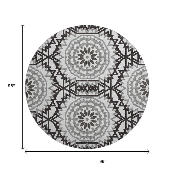 HomeRoots 8' Modern Geometric Washable Round Rug - Stylish Black & White with UV Protection for Any Space 652308