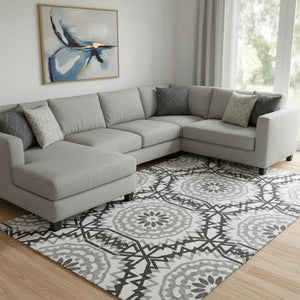 HomeRoots 10' X 14' White And Black Geometric Area Rug - Washable, UV Protected, Modern Style for High-Traffic Homes 652311