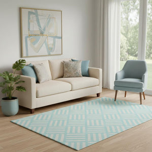 HomeRoots 5' X 8' Aqua and Ivory Geometric Washable Area Rug – Stain-Resistant, UV-Protected for High-Traffic Areas 652319