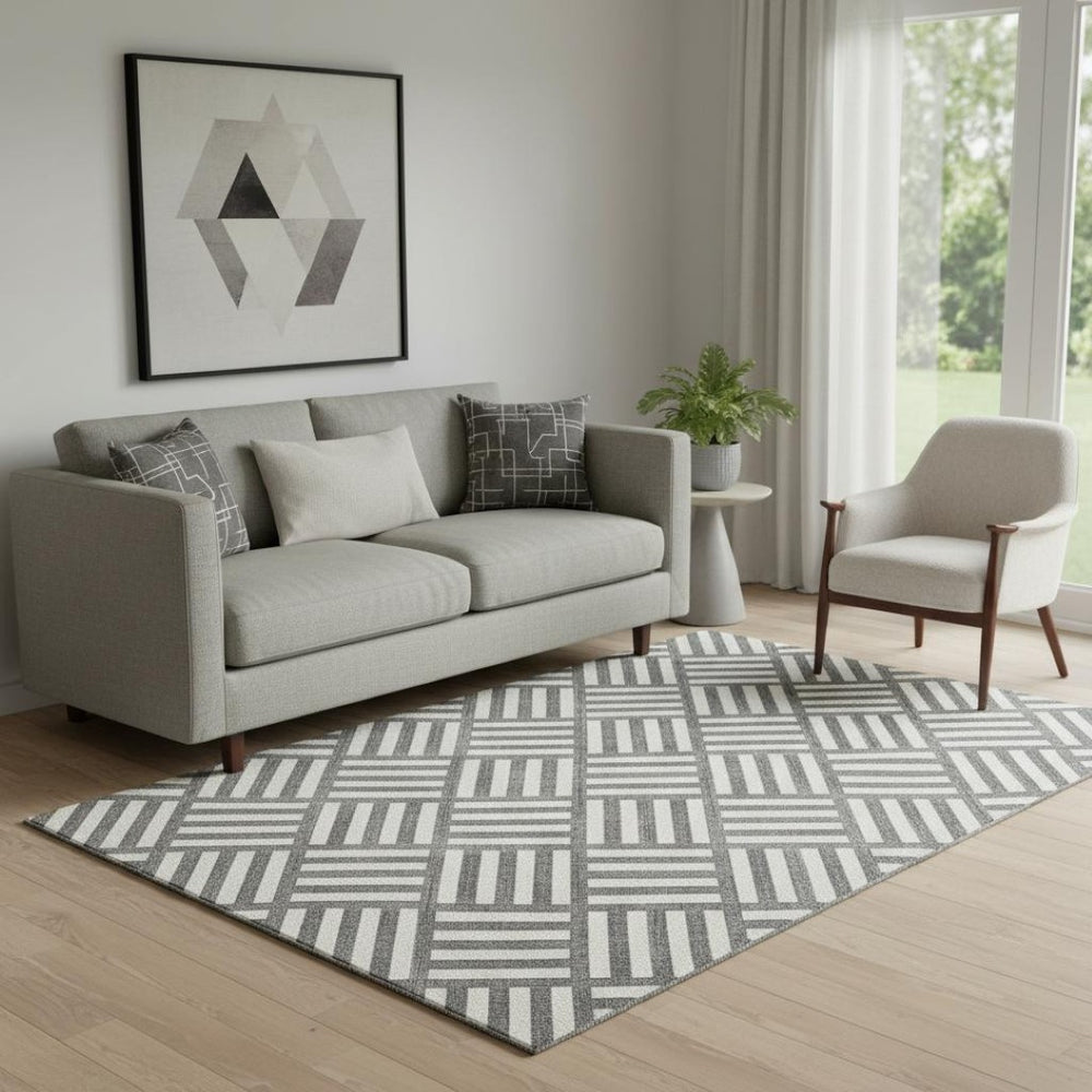 HomeRoots 5' X 8' Black And Ivory Geometric Washable Area Rug - Stylish, UV-Protected, Durable for Busy Spaces 652325