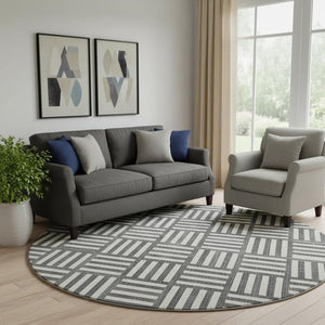 HomeRoots 8' Black And Ivory Geometric Round Rug - Washable, UV-Protected, Durable Design for Family Spaces 652326