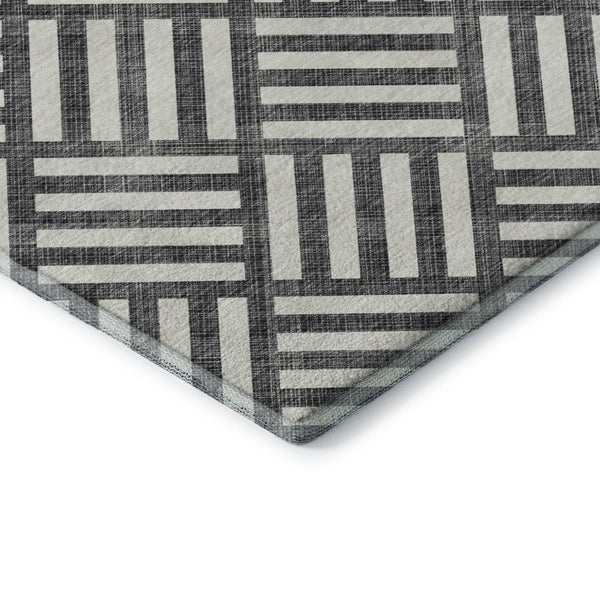 HomeRoots 8' Black And Ivory Geometric Round Rug - Washable, UV-Protected, Durable Design for Family Spaces 652326