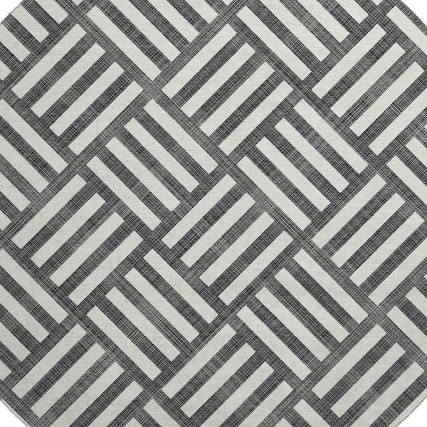 HomeRoots 8' Black And Ivory Geometric Round Rug - Washable, UV-Protected, Durable Design for Family Spaces 652326