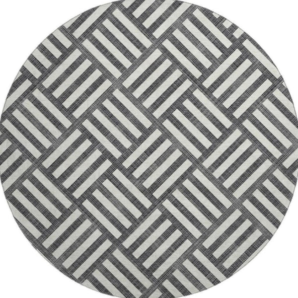 HomeRoots 8' Black And Ivory Geometric Round Rug - Washable, UV-Protected, Durable Design for Family Spaces 652326