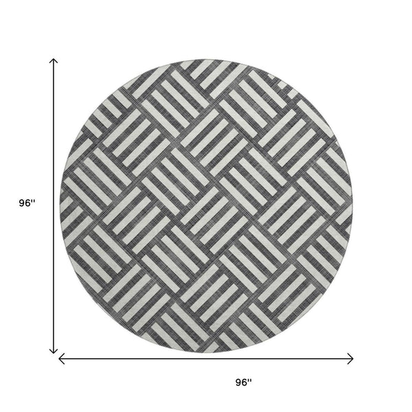 HomeRoots 8' Black And Ivory Geometric Round Rug - Washable, UV-Protected, Durable Design for Family Spaces 652326