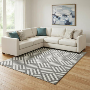 HomeRoots 9' X 12' Black and Ivory Geometric Area Rug - Washable, UV Protected, Durable for Busy Homes 652328