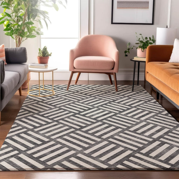 HomeRoots 10' X 14' Black And Ivory Geometric Area Rug – Stylish, Washable & UV-Protected for High-Traffic Spaces 652329